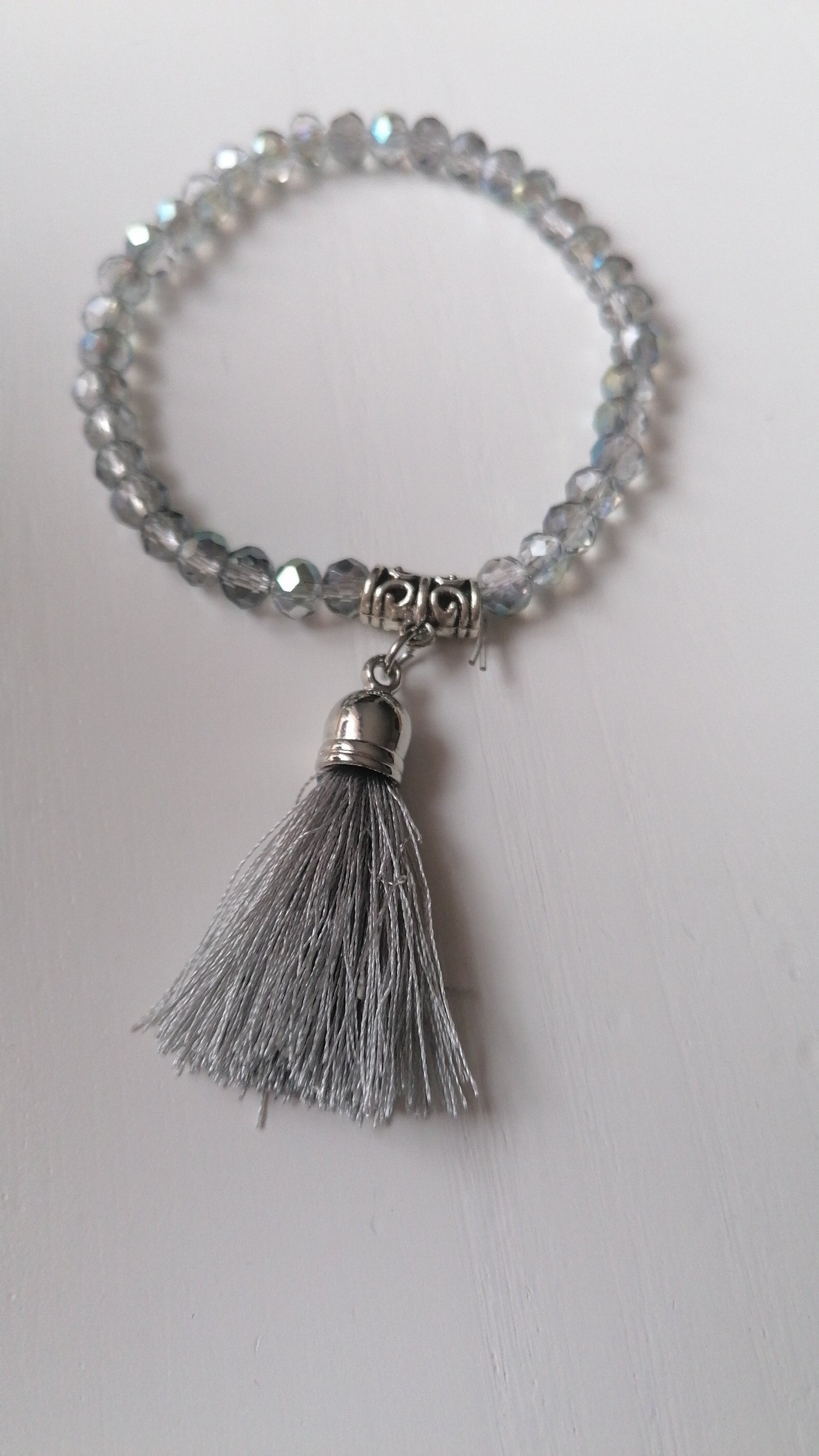 Bracelet perlé pompom